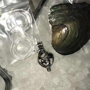 Mother child pearl cage with chain and oyster